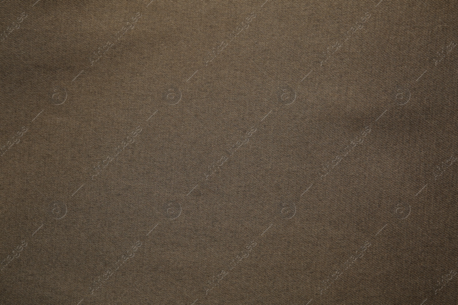 Photo of Texture of beautiful brown fabric as background, closeup