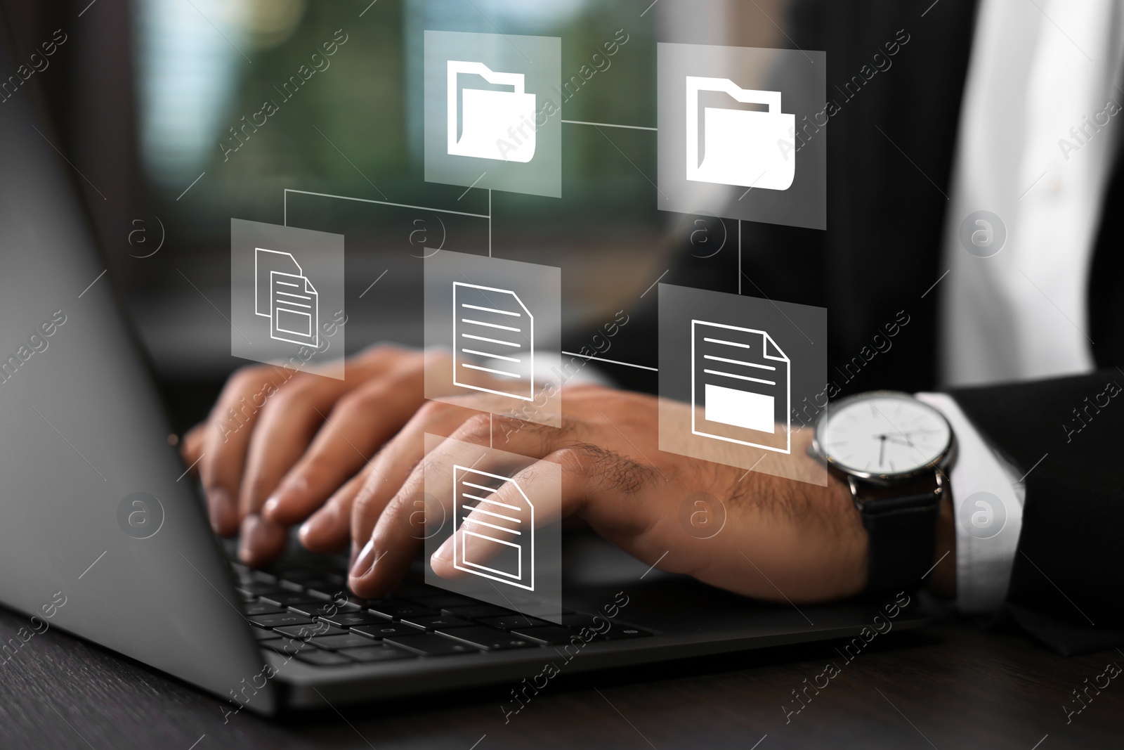 Image of File system. Businessman using laptop at table, closeup. Scheme with folders and documents over computer
