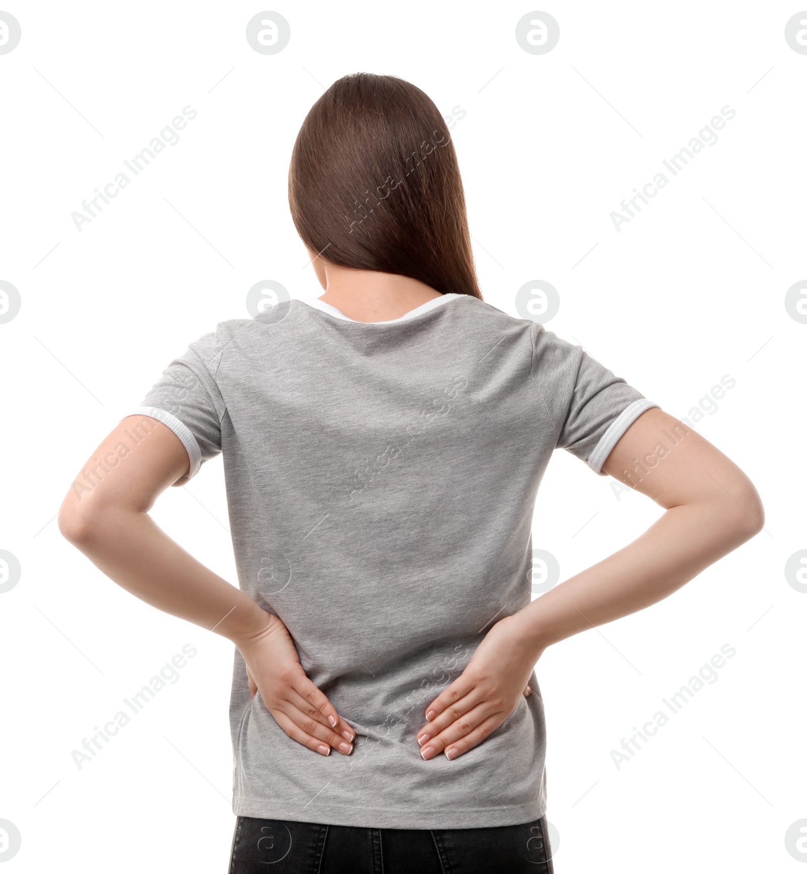 Photo of Young woman suffering from back pain on white background