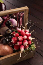 Different fresh ripe vegetables on wooden table