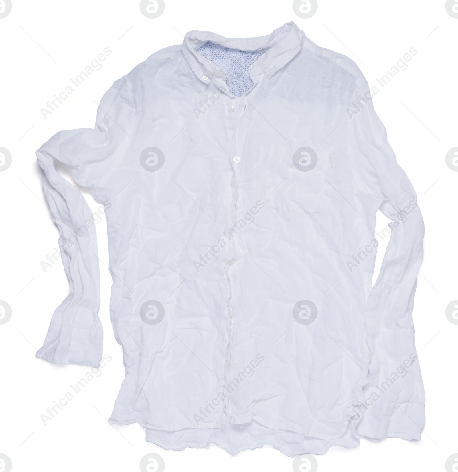 Photo of Crumpled shirt on white background, top view