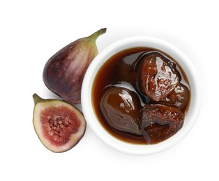 Bowl of tasty sweet jam and fresh figs isolated on white, top view