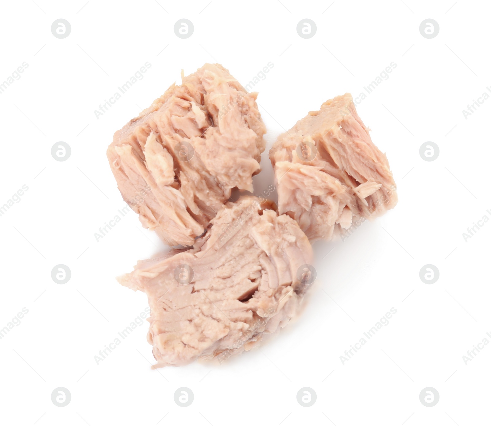 Photo of Delicious canned tuna chunks on white background, top view