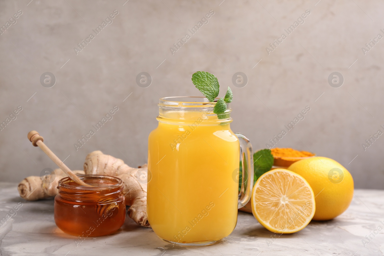 Photo of Immunity boosting drink and ingredients on table