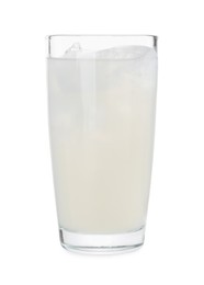 Photo of Glass of coconut water with ice cubes isolated on white