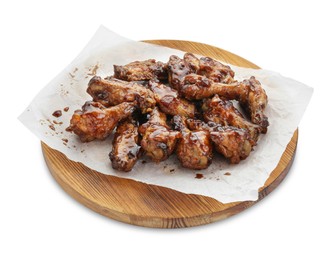 Photo of Board with tasty chicken wings isolated on white