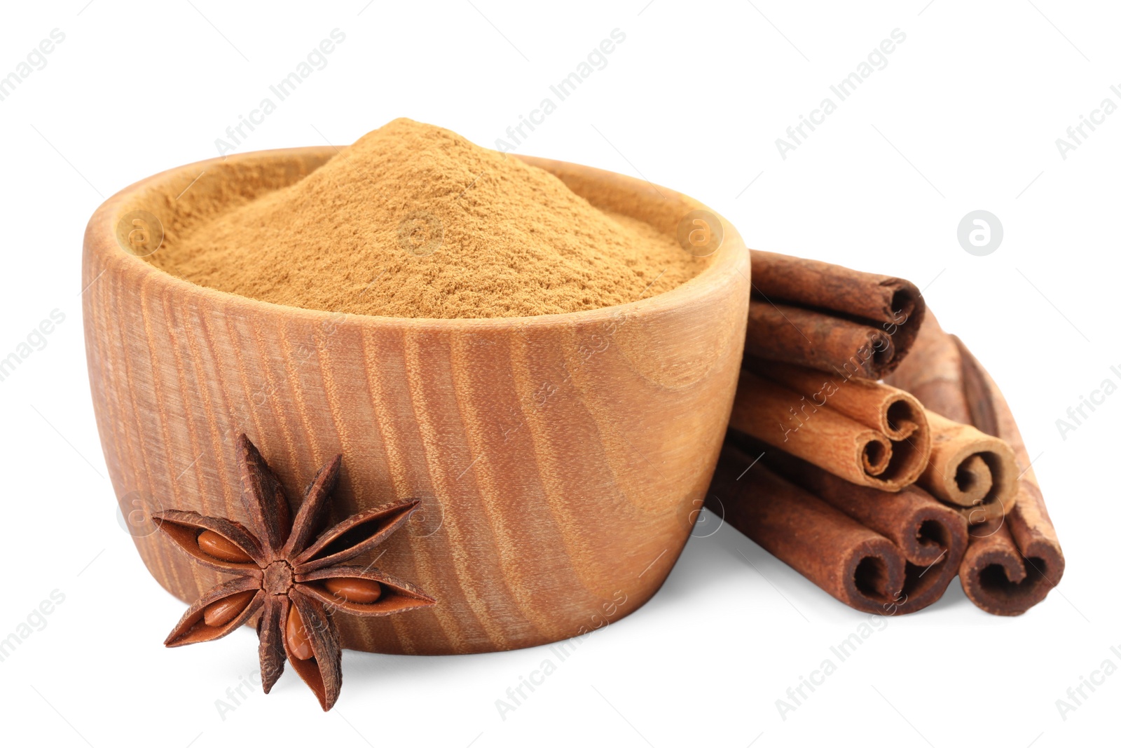 Photo of Dry aromatic cinnamon sticks, powder and anise star isolated on white