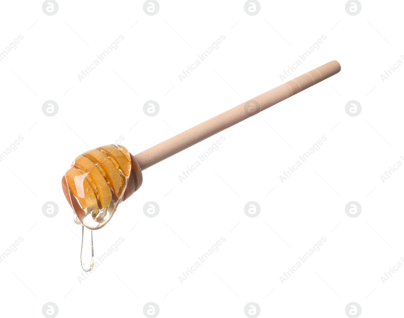 Photo of Natural honey dripping from dipper on white background