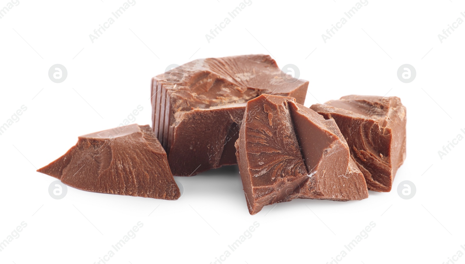 Photo of Pieces of tasty milk chocolate isolated on white