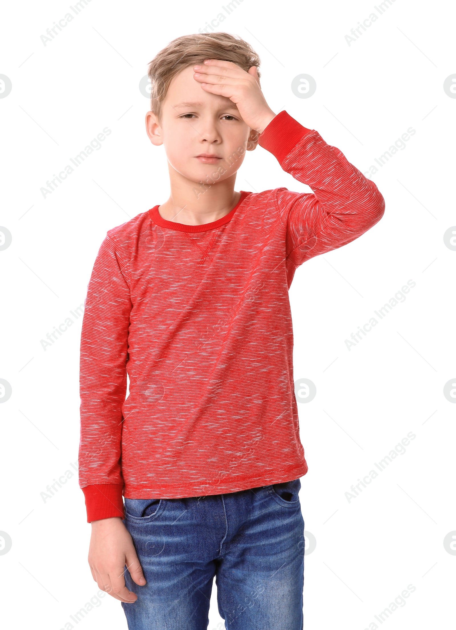 Photo of Little boy suffering from headache on white background
