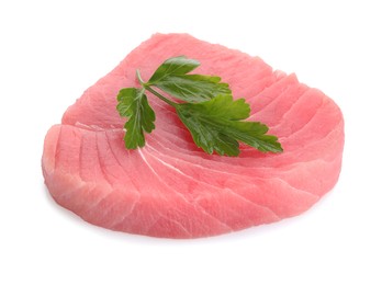 Photo of Fresh raw tuna fillet with parsley on white background