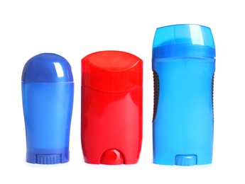 Photo of Different colorful deodorants on white background