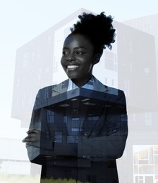 Image of Double exposure of businesswoman and office building