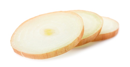 Slices of raw yellow onion on white background