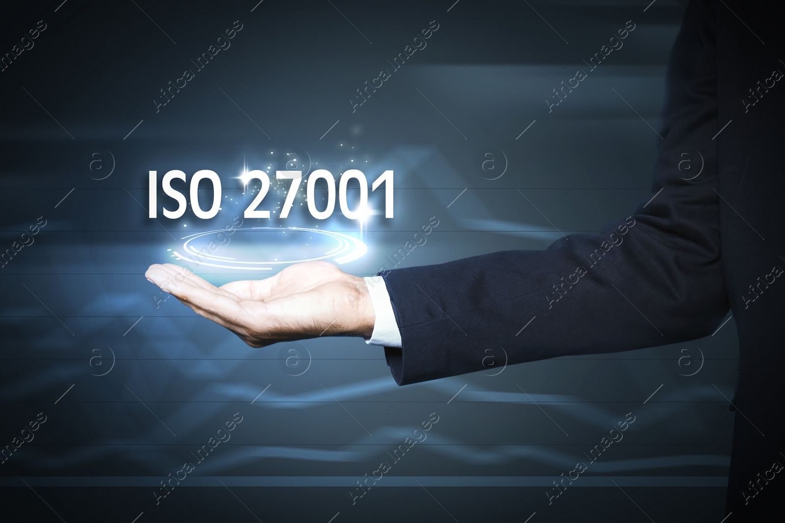 Image of Man demonstrating at virtual icon with text ISO 27001, closeup 