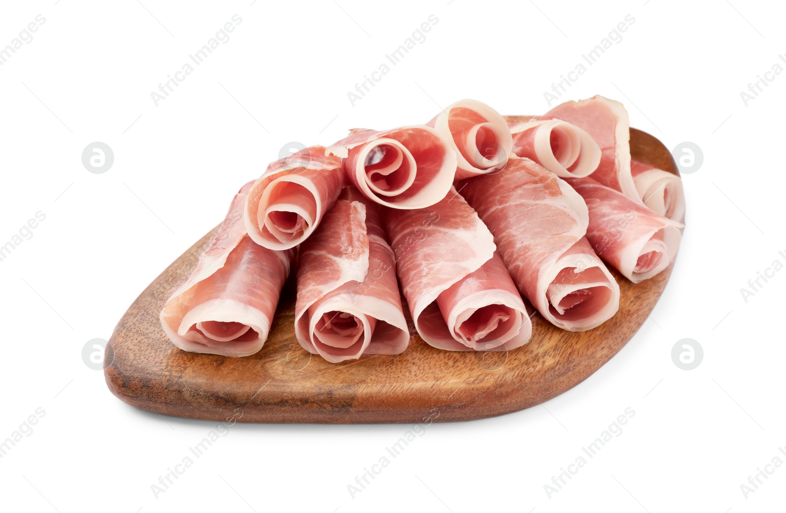 Photo of Wooden board with rolled slices of delicious jamon isolated on white