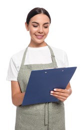 Young woman in light green apron with clipboard on white background