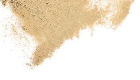 Pile of brown dust scattered on white background, top view