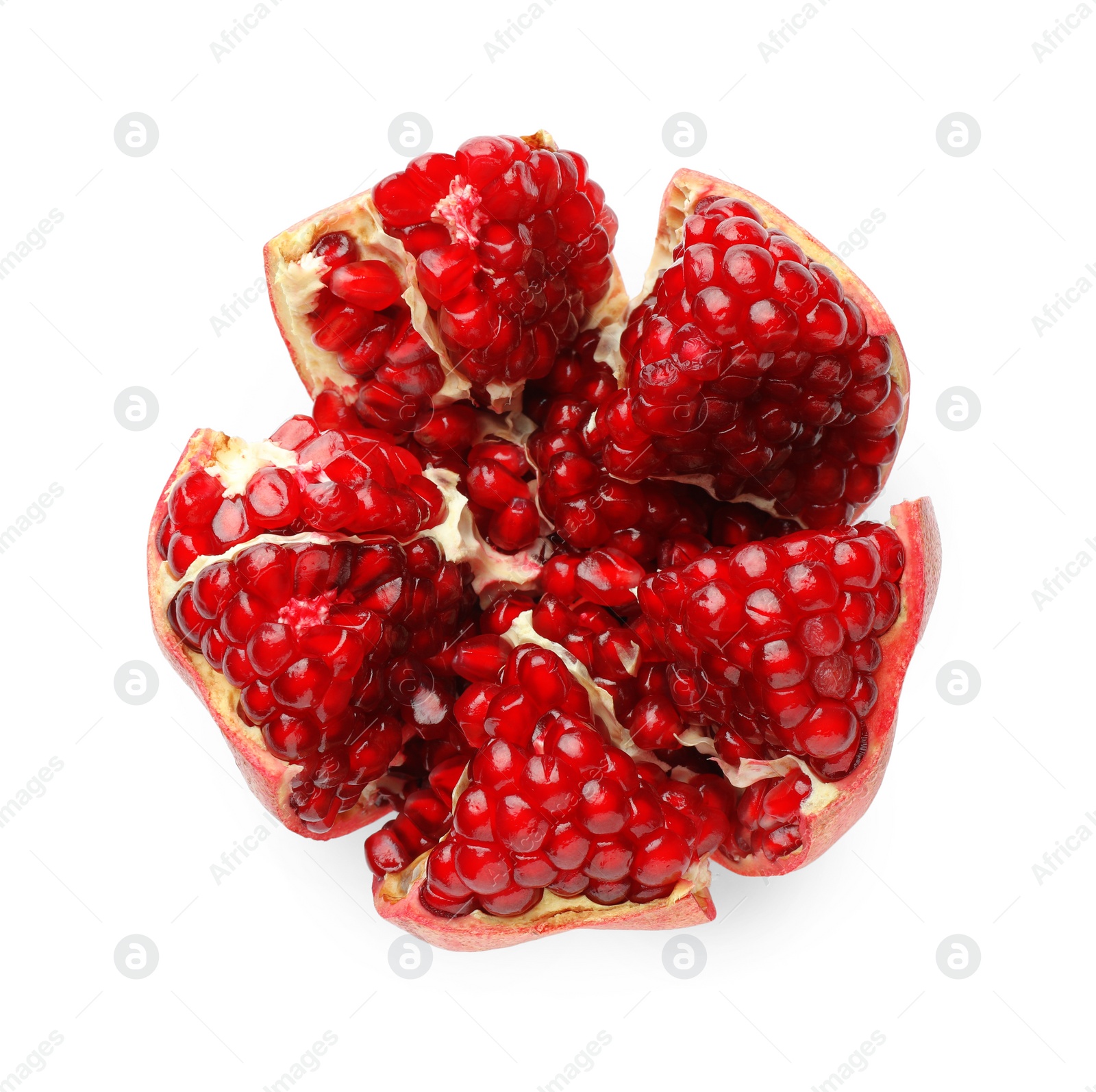 Photo of Cut fresh pomegranate isolated on white, top view