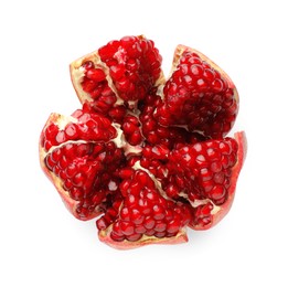 Photo of Cut fresh pomegranate isolated on white, top view