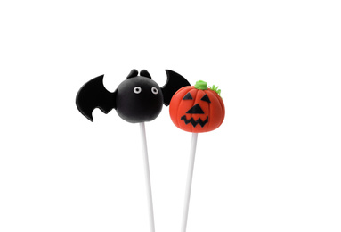 Delicious Halloween themed cake pops on white background