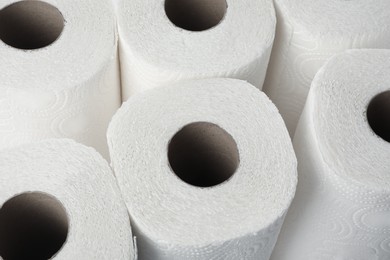 Photo of Rolls of paper towels as background, closeup view