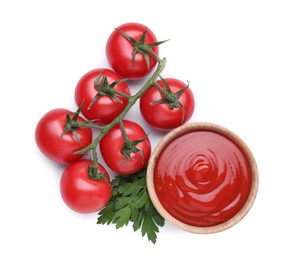 Photo of Bowl with tasty ketchup, parsley and fresh tomatoes isolated on white, top view