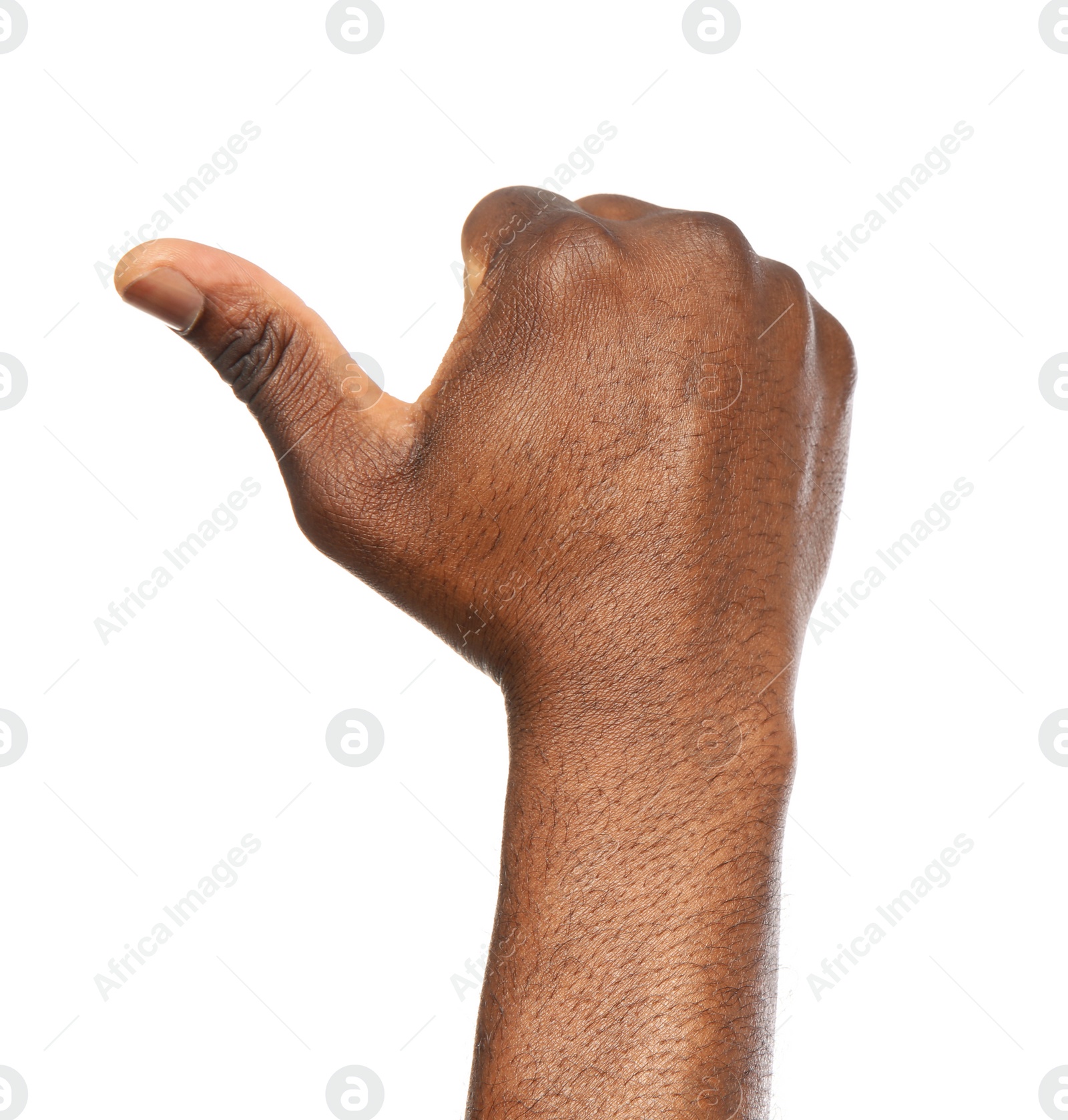 Photo of African-American man showing thumb up gesture on white background, closeup