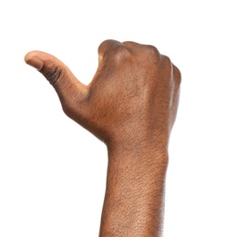 Photo of African-American man showing thumb up gesture on white background, closeup