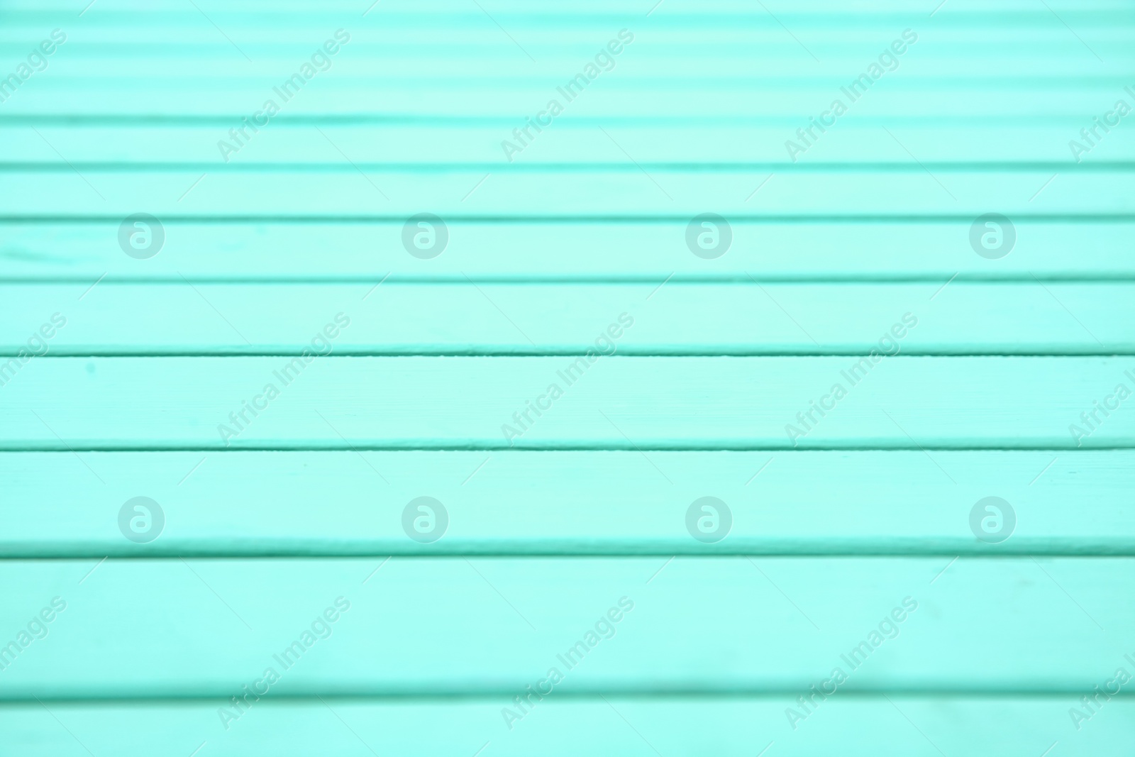 Photo of Wooden mint color surface as background