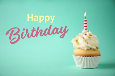Image of Happy Birthday! Delicious cupcake with candle on light green background