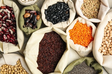 Photo of Different grains and seeds as background, top view. Veggie diet