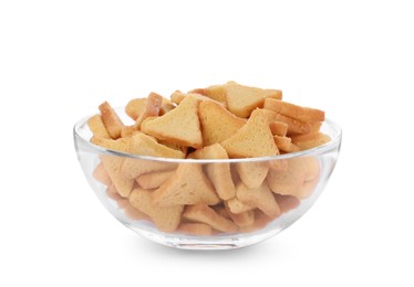 Delicious crispy rusks in glass bowl on white background