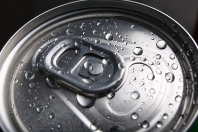 Energy drink in wet can, closeup. Functional beverage