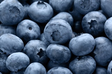 Photo of Tasty fresh ripe blueberries as background, closeup