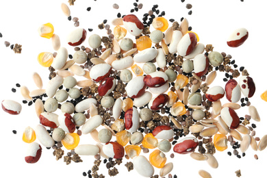 Photo of Mix of vegetable seeds on white background, top view