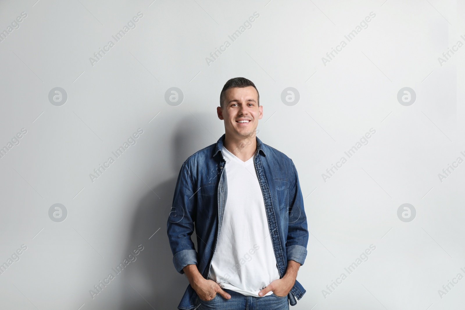 Photo of Portrait of handsome man on white background