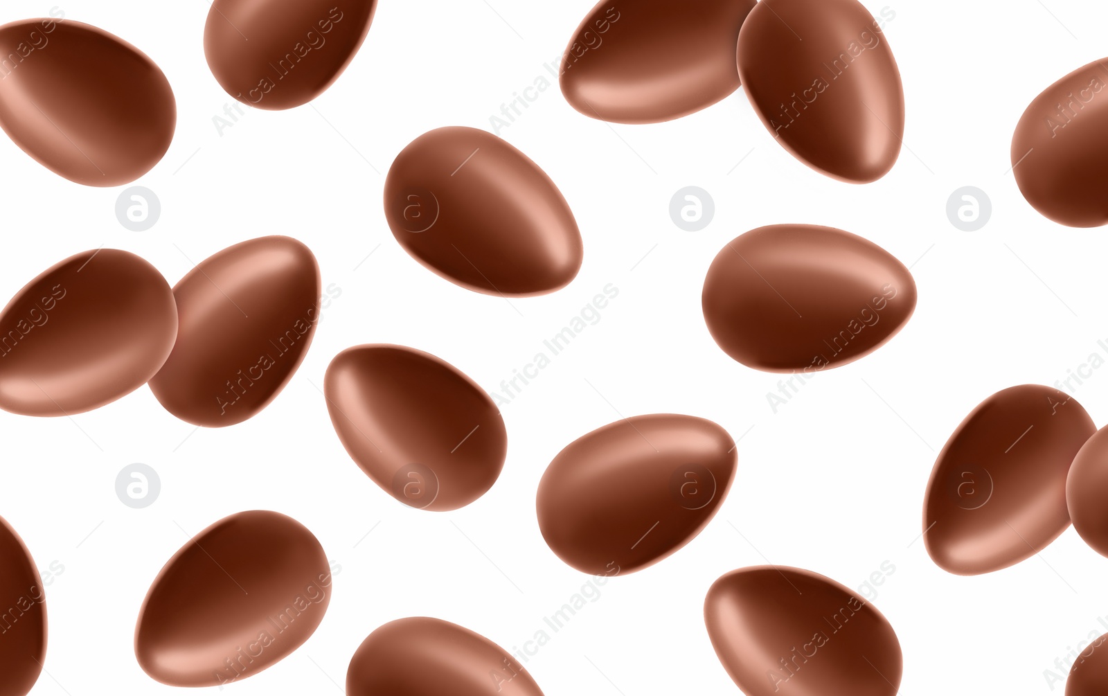 Image of Many chocolate eggs falling on white background