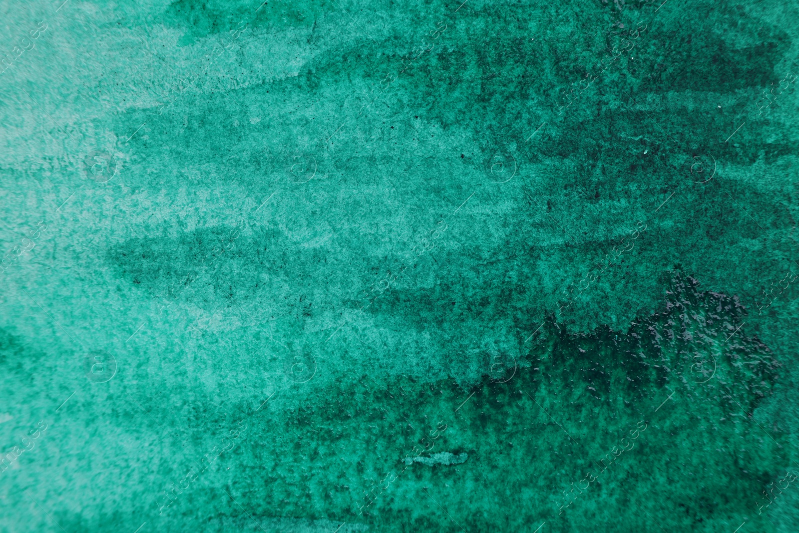 Photo of Abstract green watercolor painting as background, top view