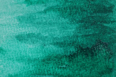 Photo of Abstract green watercolor painting as background, top view