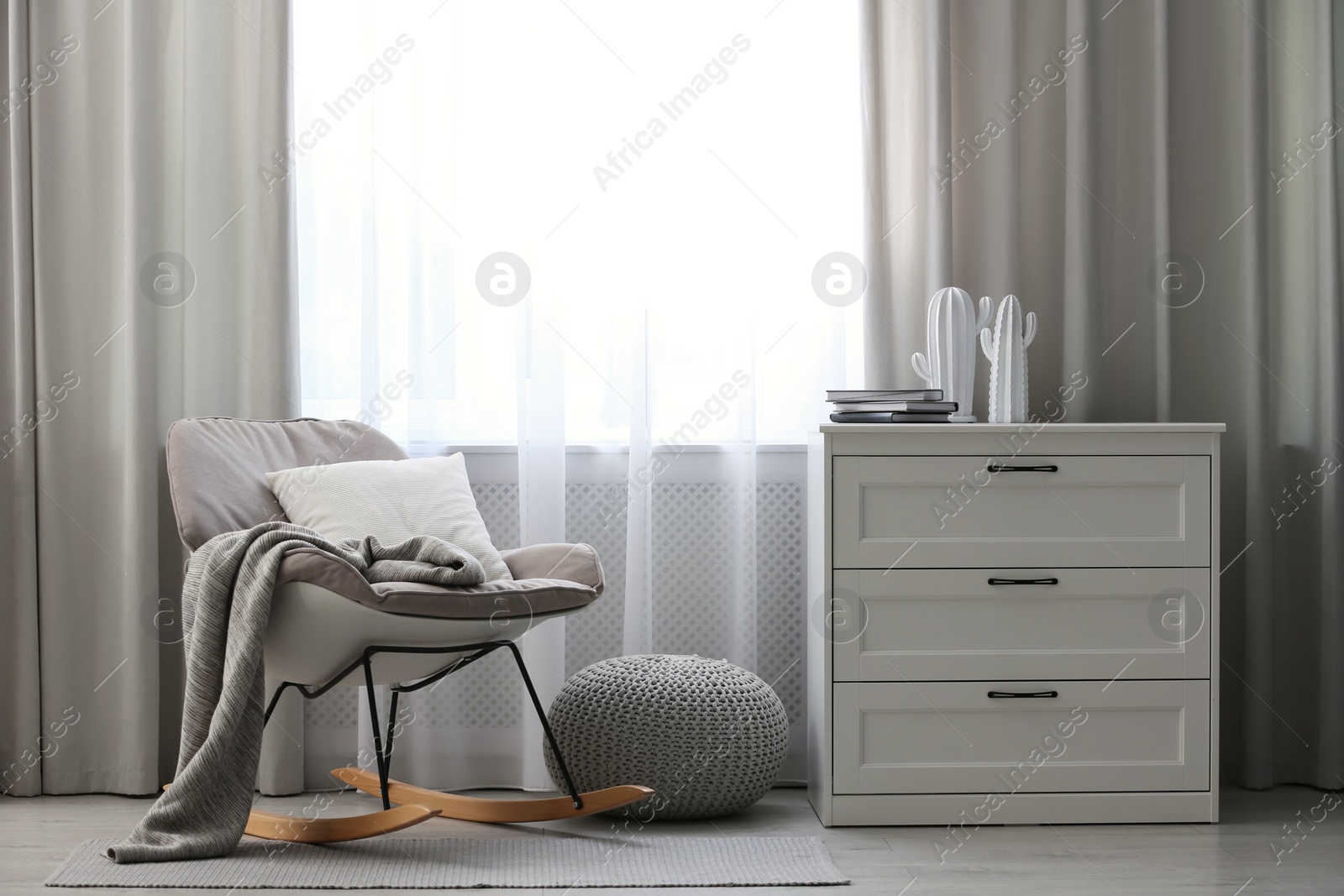 Photo of Beautiful curtains on window in stylish room interior