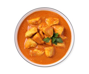 Bowl of delicious chicken curry on white background, top view