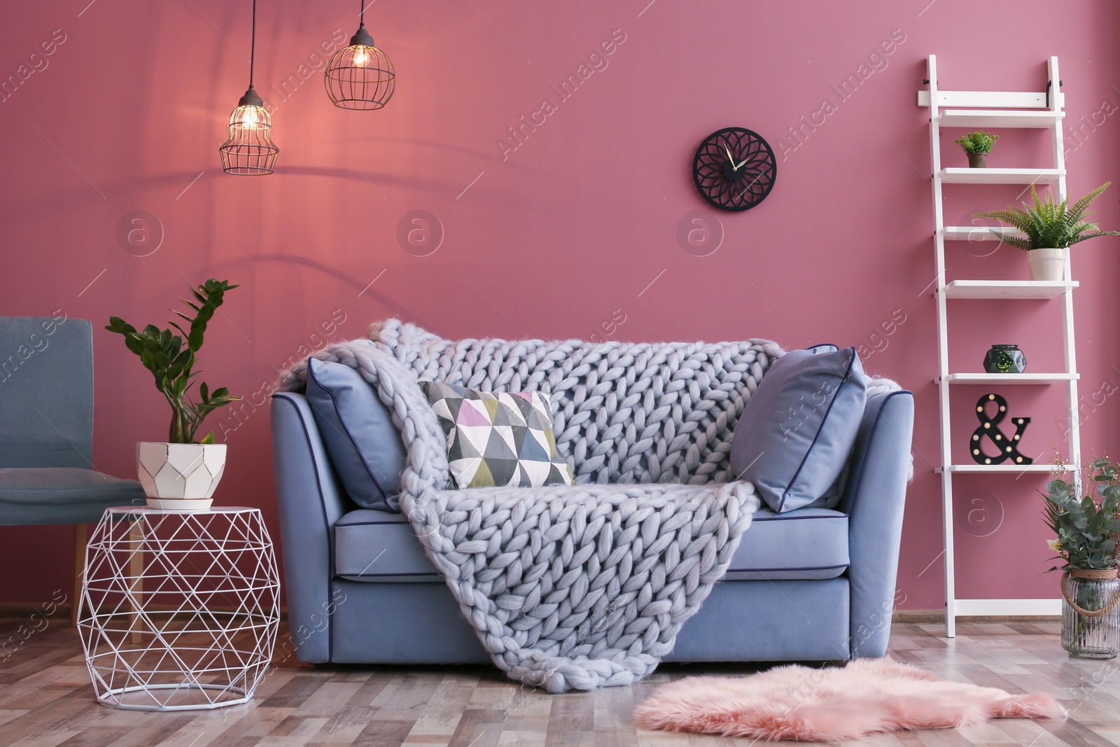 Photo of Cozy living room interior with comfortable sofa