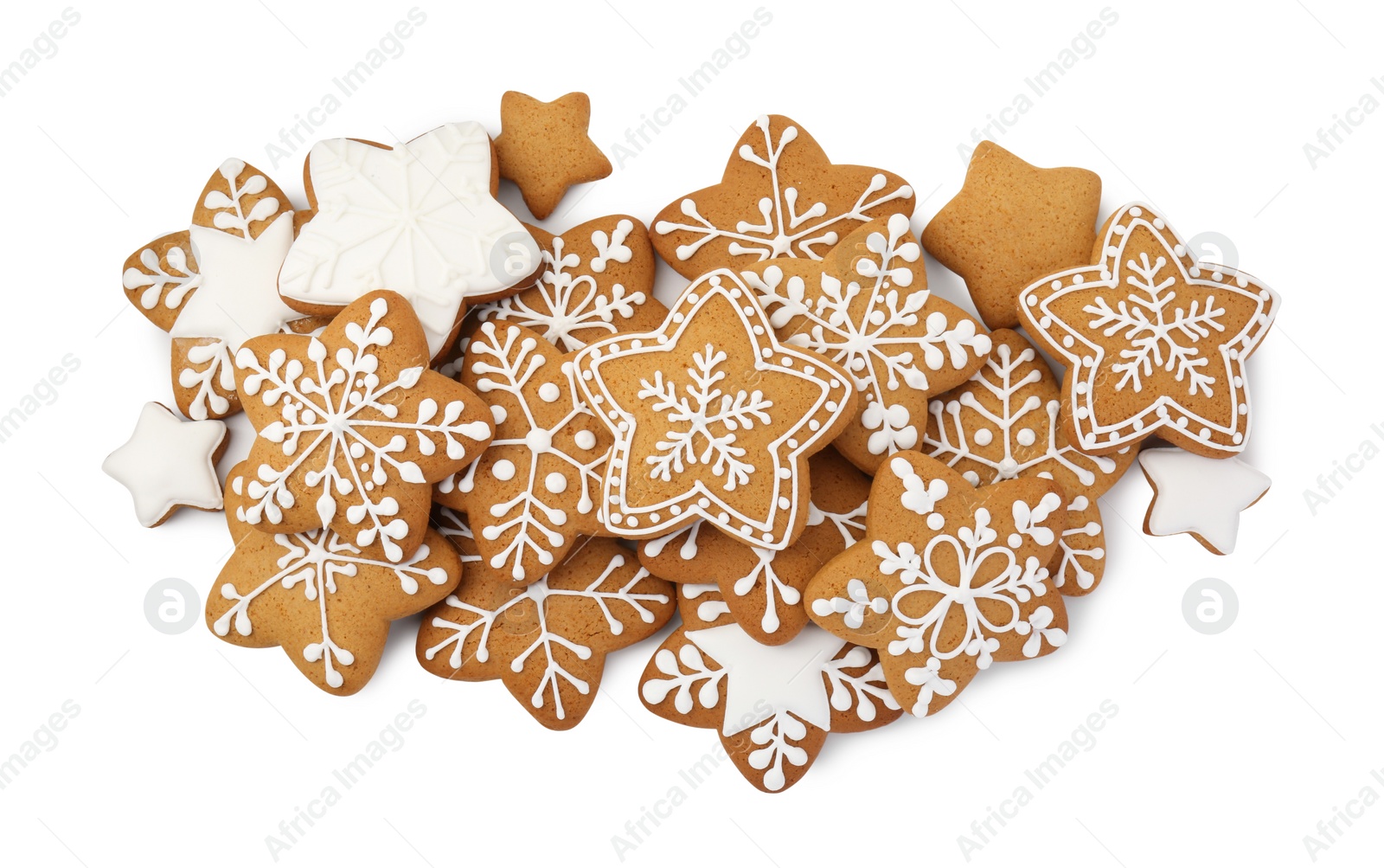 Photo of Tasty star shaped Christmas cookies with icing isolated on white, top view