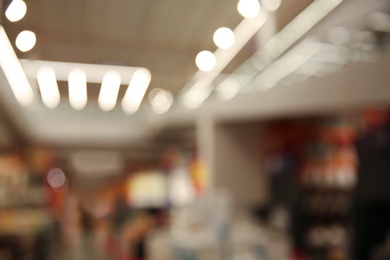 Blurred view of modern shopping mall interior