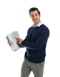 Young male teacher with notebooks on white background