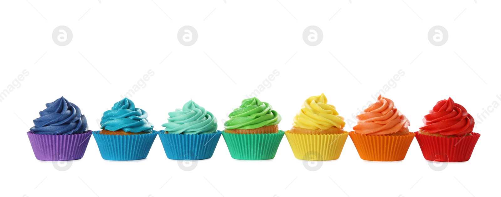 Photo of Delicious birthday cupcakes decorated with cream isolated on white