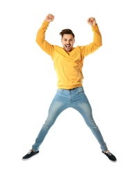 Full length portrait of happy handsome man jumping on white background