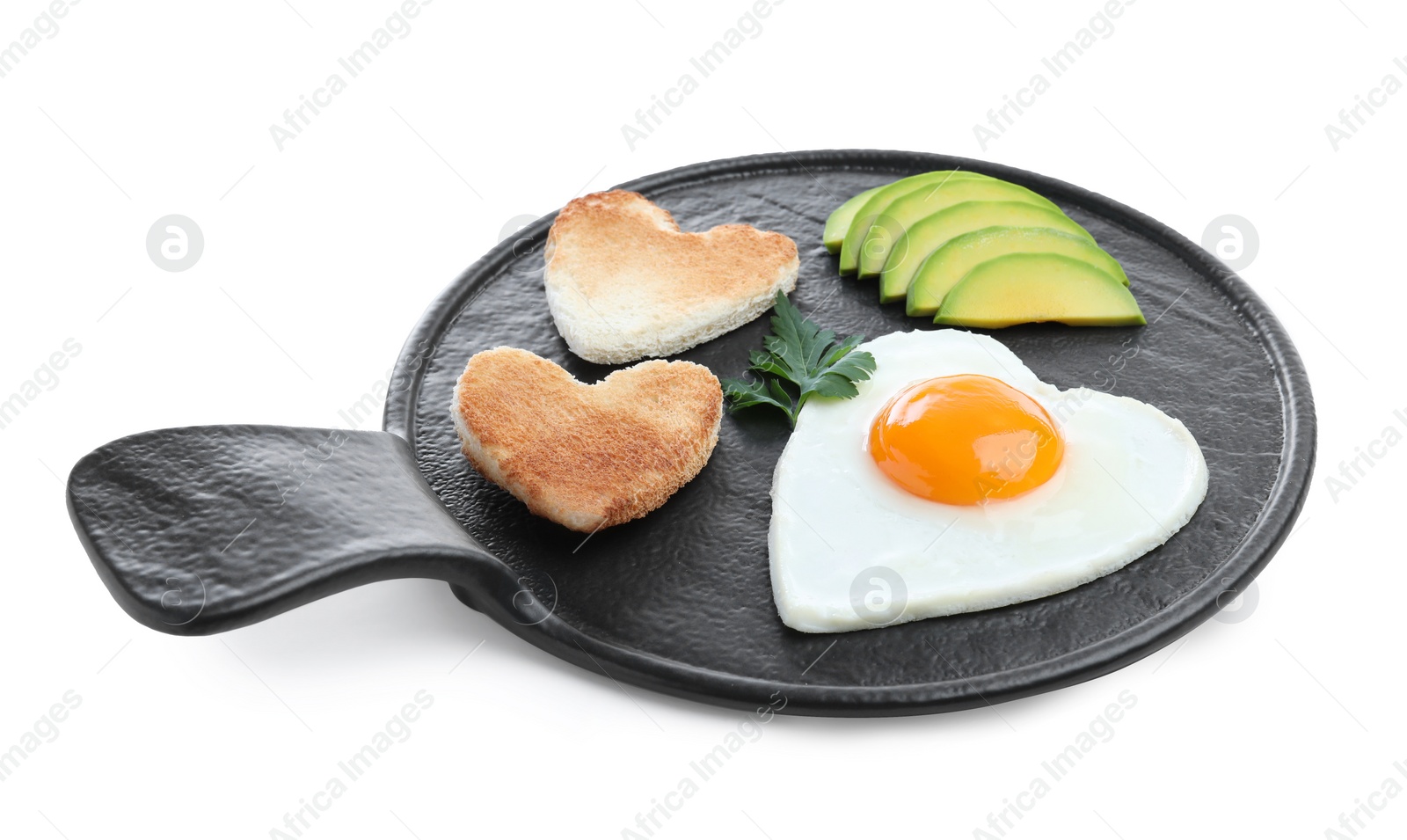 Photo of Romantic breakfast with fried heart shaped egg, avocado and toasts isolated on white. Valentine's day celebration