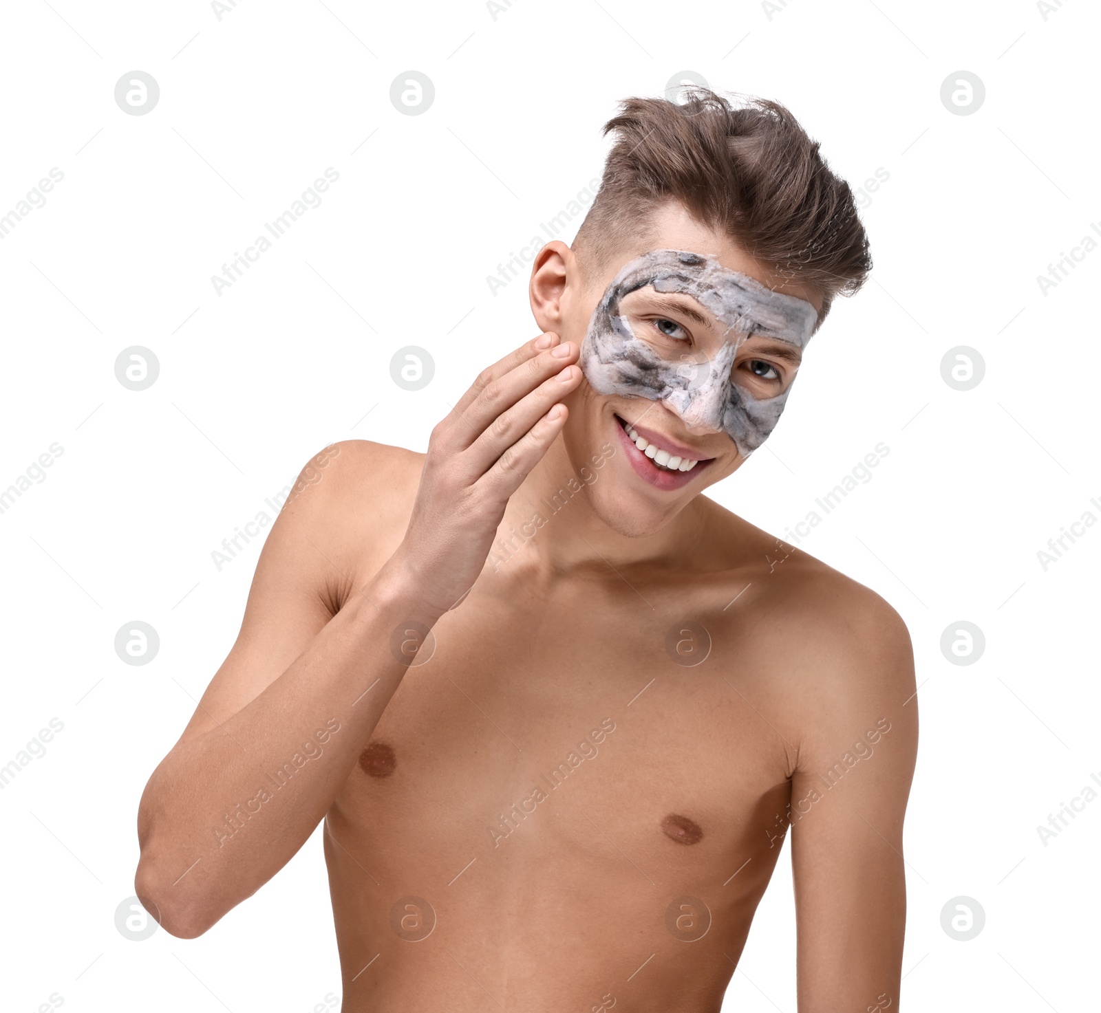 Photo of Handsome man with clay mask on his face against white background